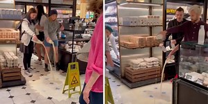 Vegan activists pour milk out onto floor in Harrods before being grabbed by security