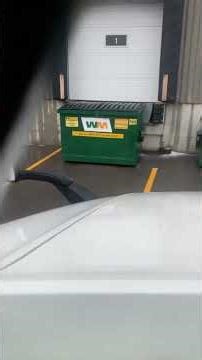 Tractor trailer backing in (cab view) first stop.”