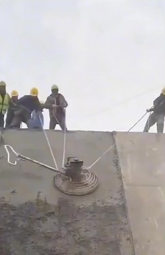 Vertical Concrete Finishing with Power Trowel