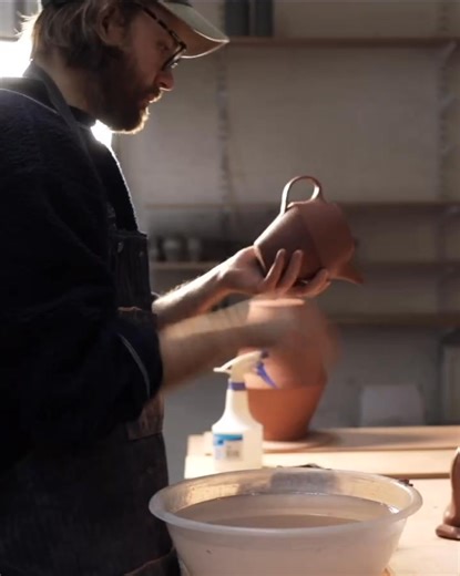 This Sunday’s YouTube film the process of how I assemble a stoneware teapot from a collection of different thrown parts, all of which I made in my previously uploaded video, (you can find a link to the full video my profile’s biography). Before the spout and handle can be carefully attached, I start by trimming the jar and lid to fit snugly together, a process the full video goes over in great detail, with my usual commentary and a bonus wintery start. The body is pierced, so tea can flow throug