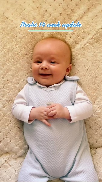 Capturing a Beautiful Milestone: 14-Week-Old Baby's Development Journey