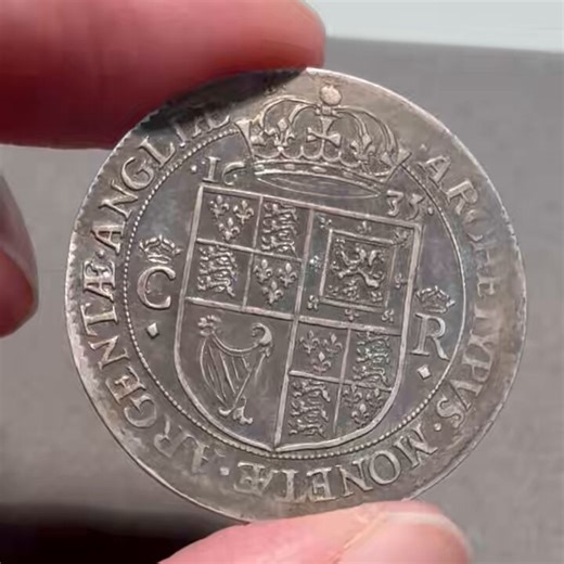 The royal arms appear on this pattern shilling of Charles I that dates to 1635. It was produced via machinery (most other English coins of the time were struck by hand). The coin did not enter circulation. This specimen from the Hunterian is one of very few surviving examples.