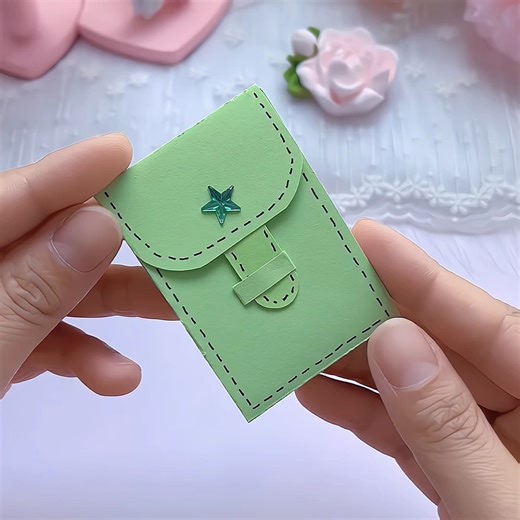 63K views · 581 reactions | Title: "Colorful Rainbow Card Holder: A Delightful Origami Tutorial" Hashtags: #OrigamiTutorial #ParentChildHandicraft #HandmadeDIY #HandmadeOrigami #CardHolderCraft | paper craft ideas | Facebook