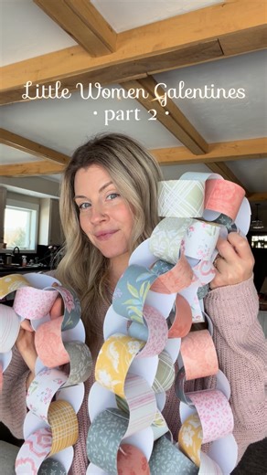 Christina Hoss | DIY & DESIGN on Instagram: "Part 2 of Little Women Galentines 💘 If you loved making paper chains as a kid, then you’ll love this DIY! For this DIY I used 12” scrapbook paper and cut them into 2”x10” strips. Ribbon or fabric scraps would be a cute alternative! You may think this looks a bit springy and yes, it does, but I don’t really love Valentine’s Day decor. So instead of going with the bold, traditional, reds, pinks, and purples I brought in other color palettes that I love