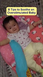 8 Tips to Soothe an Overstimulated Baby 🕯️ 1. Dim the lights. Soft lighting helps calm their senses — especially after being in a bright, noisy environment. 🤫 2. Lower the noise. Turn off the TV or loud music. Use a soft voice. Babies feel calmer in a quiet space. 👩‍👦 3. Hold them close. Skin-to-skin or gentle cuddling on your chest makes them feel safe and regulated. 🎵 4. Use soft, rhythmic sounds. Shushing, humming, or white noise (like a fan or sound machine) can help them settle. 🚶 5. 