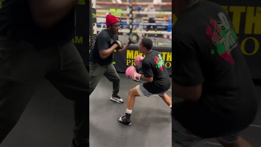 JHON INGRAM MAKING MUSIC DURING RAPID FIRE PAD DRILL AT MAYWEATHER GYM