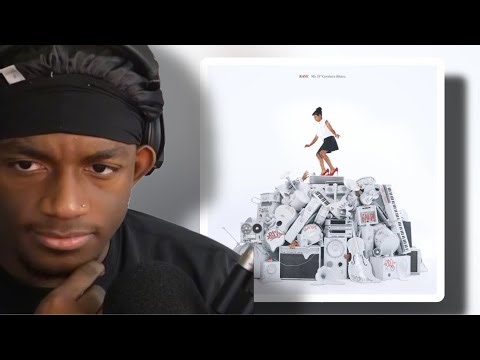 my 21st century blues by raye is unique!