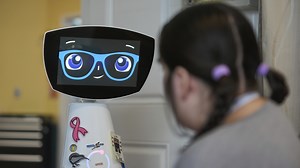 A robot programmed to act like a 7-year-old girl works to combat fear and loneliness in hospitals