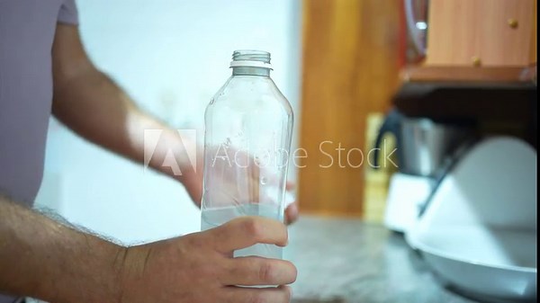 This guide focuses on clearly demonstrating the simple process of opening a bottle of water