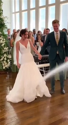 Bride's Dress Becomes a Mini Fountain at Wedding
