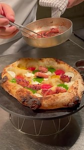 “Octopus in colour” @alterego_pizzaboutique Pizza base baked with river pebbles, octopus cooked at a low temperature and baked in a wood-fired oven, mozzarella ricotta and pecorino mousse, San Marzano tomato sauce, confit leek cream, yellow date tomato sauce, celery sauce and dehydrated black olives. #pizza #pizzalover #gourmet #puglia #cheflife #foodporn #gourmetfood #gourmetdinner #christmasgastronomy #foodgasm | ChefsAlert