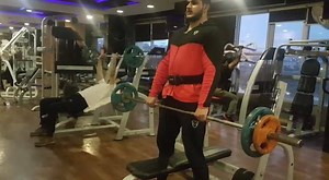 Our trainner BILAL TANEEER performing Rack pulls.Rack pulls can be used to increase pulling strength,develop stronger trapezius and back muscles,strengthen the posterior chain and enhance grip strength. In addition,the rack pulls can be used to increase lock out strength for lifters who have issues above the knee. Inbox for details or contact on 03325597180 | Ginnastic Arena