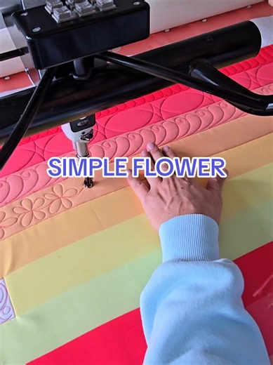 Day 32 of my free Strip by Strip class and today we’re quilting these fun, fast flowers. 🌸 This is one of those designs that looks great but is actually really simple to stitch—just start in the center and quilt soft loop petals around it. Your petals don’t have to match perfectly, the relaxed loops are what make the flower look natural. This is a great free-motion design to practice when you want something quick, playful, and beginner-friendly. You can still join the class at any time. Comment