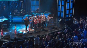 12M views · 519K reactions | A beautiful message of hope ❤️ Jelly Roll performs with local elementary school providing a powerful performance of “I Am Not Okay” as part of a broadcast this year at the Grand Ole Opry. Tune in Saturday nights at 9/8c for Opry Live on our YouTube and Facebook channel for more recent performances from the Opry stage. | Grand Ole Opry | Facebook