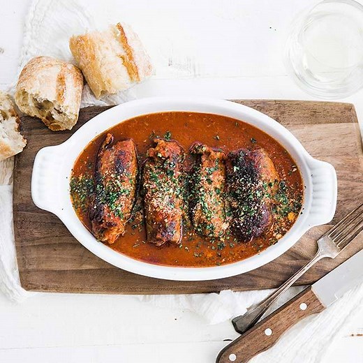 These delicious Beef Braciole are stuffed up with herb bread crumbs and simmered in a tasty tomato sauce! Recipe at https://bit.ly/3krjGKX | Chef Billy Parisi