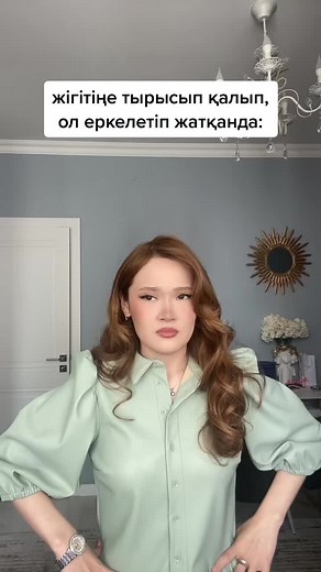 Light Green Blouse Style in Indoor Setting