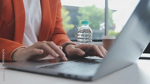 StartUp Programming Team. Website designer working digital tablet dock keyboard and computer laptop with smart phone and compact server on marble desk,filter film effect