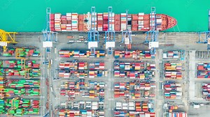 Container ship, Business logistic import-export transport international and transportation of containers in port , Shipping container buildings, Aerial at night view of Shipping container worldwide