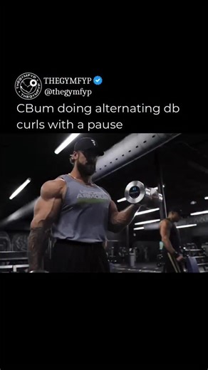 CBum doing alternating db curls with a pause Comment “CBUM” and I’ll send you the 8 day workout split Cbum used to win his 5th Olympia @cbum | Thegymfyp