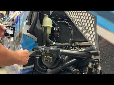 Oil filter relocation assembly