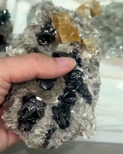 xuebaoding mine scheelite with mica and cassiterite.