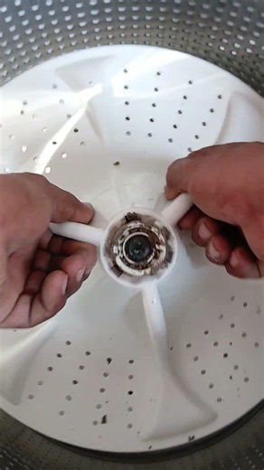 How to remove the agitator from a washing machine #construction #shortvideos #artist #washingmachine