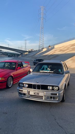 Sporty BMW Cars Under Urban Overpass