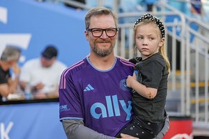 Dale Earnhardt Jr. and Wife Amy Reveal the Heartwarming Story Behind Their Daughter Holding the Victory Flag at Pocono