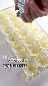 The making of these quirky little bonbons to help Looney Tunes celebrate Tweety’s 80th birthday 🥳 . I wanted this design to be slightly abstract, so went with a birdcage-esque shape, and added gold stripes to suggest cage bars. The blue is color-matched to Tweety’s eyes, and I added black and white paint spatters to represent Sylvester’s tendency to always muck things up. I wanted to give the impression that Tweety can’t be caged in and happily flutters wherever he wants, so topped each bonbon 