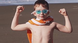 Young Boy Beach Flexing Muscles Superhero Stock Footage Video (100% Royalty-free) 4587299 | Shutterstock