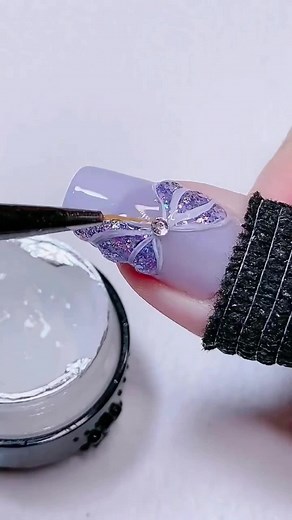 3D bow tie nail hack tutorial #3dnailsdesign #bowtienails #nailhackcheck #nailtutorial #purplenails #glitternails #nailpowdercolor #nailglitterpowder #nailpowderhacks #prettynailschallenge #nailideas💅💓 #naildesign #naildiyartist #💅💅💅