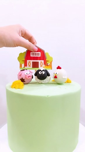 Adding another childhood favourite with our Animal Farm cake 🎂 Been a while since we’ve made a barnyard themed #spbcelebrationcakes filled with our animal cake pops 😁 so I’ve made them extra kawaii for little Oliver 🐑🐷🐔 • • Created with love for Christine ❤️💕 | Sugar Pop Bakery