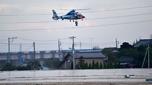 Helicopters rescue those trapped after Japanese floods