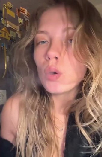 Beautiful blonde woman smoking