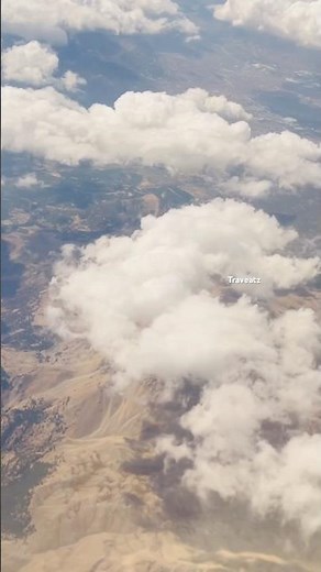 Flying Through the Clouds: A Breathtaking Aerial View of the Landscape #nature #naturelovers
