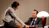Secretary flirting with boss