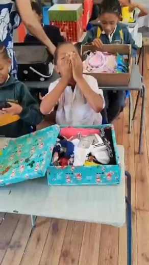 Witness the magic unfold as our beloved beneficiary children open their Santa Shoeboxes! | Santa Shoebox Project