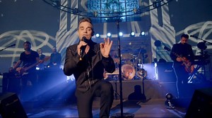 25K views · 319 reactions | Robbie Williams in one of the coolest locations, St. John's in Hackney Church. The award-winning and multi-platinum singer presents songs from his new album "The Heavy Entertainment Show", but fans of his classics are not neglected either. | Robbie Williams • The Unforgettable Concert | Facebook