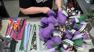 Get ready to welcome the season with this stunning deco mesh spring wreath tutorial! 🌸 Coach Julie is showing you step by step how to bring this fresh, floral beauty to life—full of lush greenery, pops of purple, and gorgeous ribbons! Who's ready to DIY this design?! | Southern Charm Wreaths