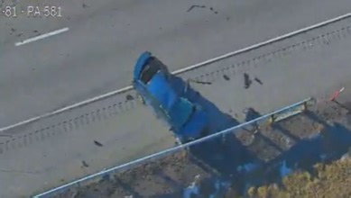 Crash involving tractor-trailer sends 2 people to hospital