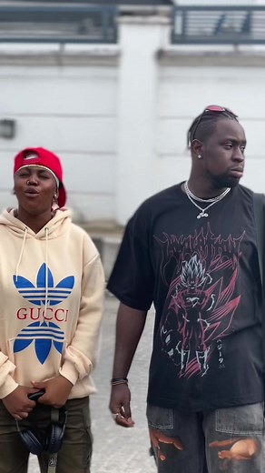 Casual Streetwear Conversation in Urban Setting