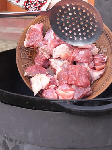 Traditional Crimean Tatar Lamb Pilaf Cooking in Village Setting