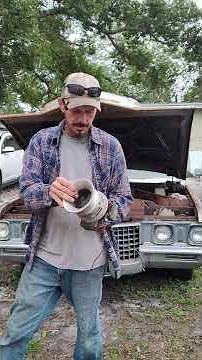 You asked about that old school siren under the hood of our caddy. it's a Homemade alarm. 70's DIY