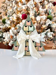 This tree advent calendar is the cutest way to count down! It’s so festive and something you’ll bring out every year. A little Christmas magic for every day of December 🎄✨ Add to cart right now, it’s almost Advent season! #adventcalendar #Christmas #HolidaySeason #amazonfinds | Everything Envy
