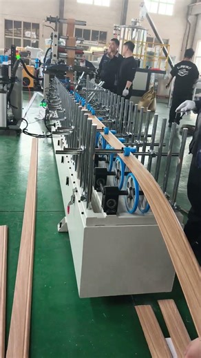 PVC Skirting PUR hot glue lamination machine #machine#lamination #laminatingmachine tion