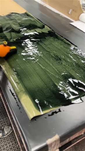 Behind the scenes in our Chicago design studio: the making of Weathered Walls™ in Bottle Green. One of Maya Romanoff’s earliest and most iconic designs, this hand painted paper features rich dyes and deep striations that evoke fine lacquered leather. Shown here in Bottle Green, a deep and dramatic green that is one of our favorite colorways! . . . #walltowallwithmaya #luxurywallcoverings #wallcovering #interiordesign | Handmade Wallcovering | Interior Design | Commercial Design | Maya Romanoff