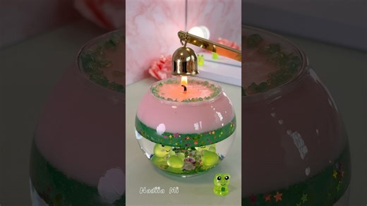 Tiny frogs inside a handmade water candle