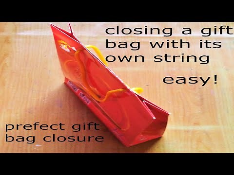 easy! closing a gift bag with its own string/ perfect gift bag closure/close gift bag with handles