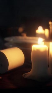 Table setting in candlelight at night