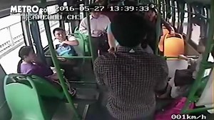Passenger grabs bus steering wheel to stop bus